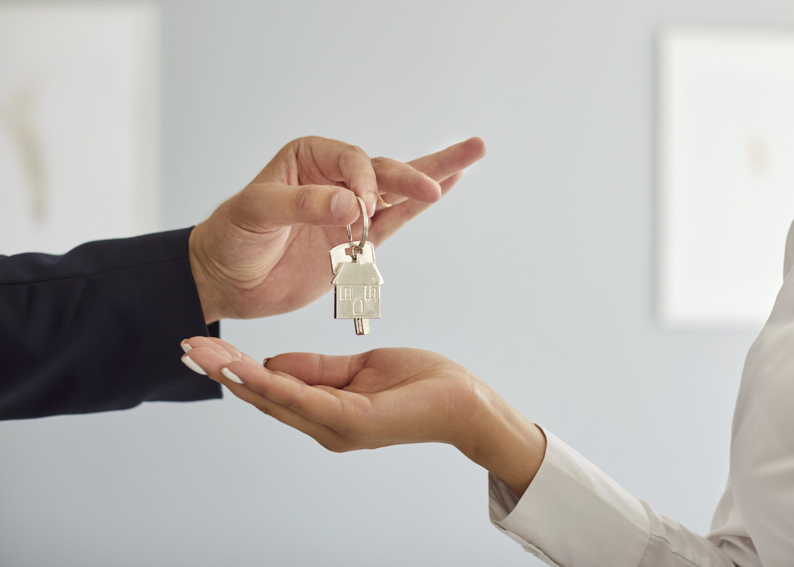 Professional,Realtor,Giving,Buyer,Key,To,New,Home.,Close,Up