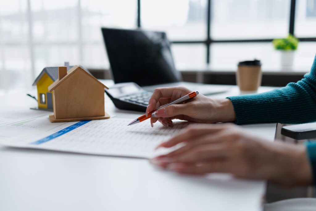 Landlord reviewing tenant screening criteria rental application.